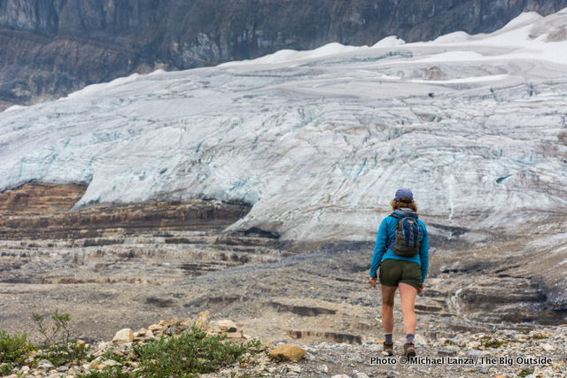A hiker on the Iceline Trail below the Emerald Glacier in Yoho National Park, Canadian Rockies.