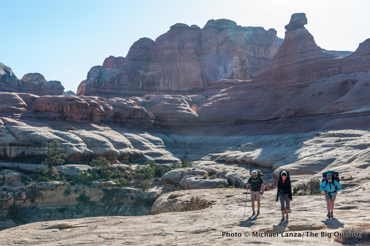 Backpackers in Squaw Canyon, Needles District, Canyonlands National Park.