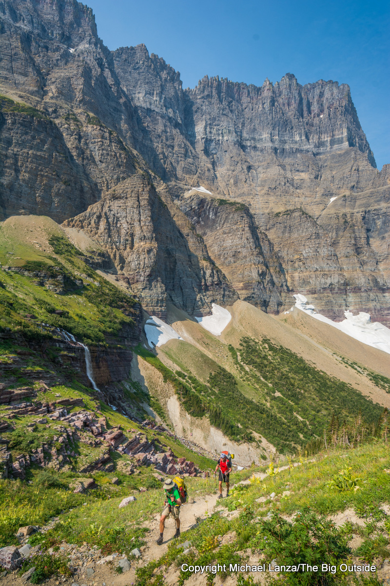 Backpackers hiking the Continental Divide Trail in Glacier National Park.