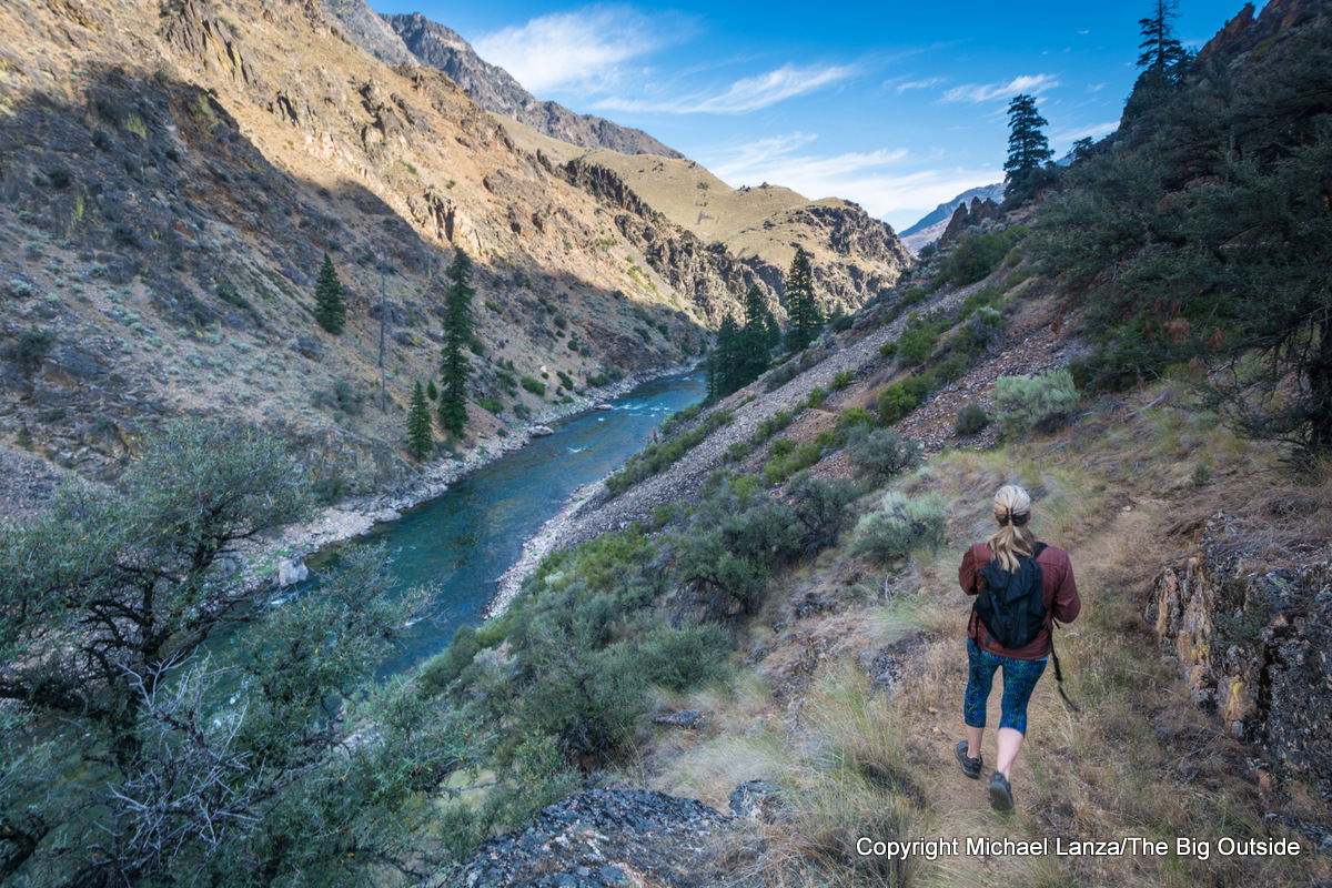 A hiker on the Middle Fork River Trail 44 in Idaho's Frank Church-River of No Return Wilderness.