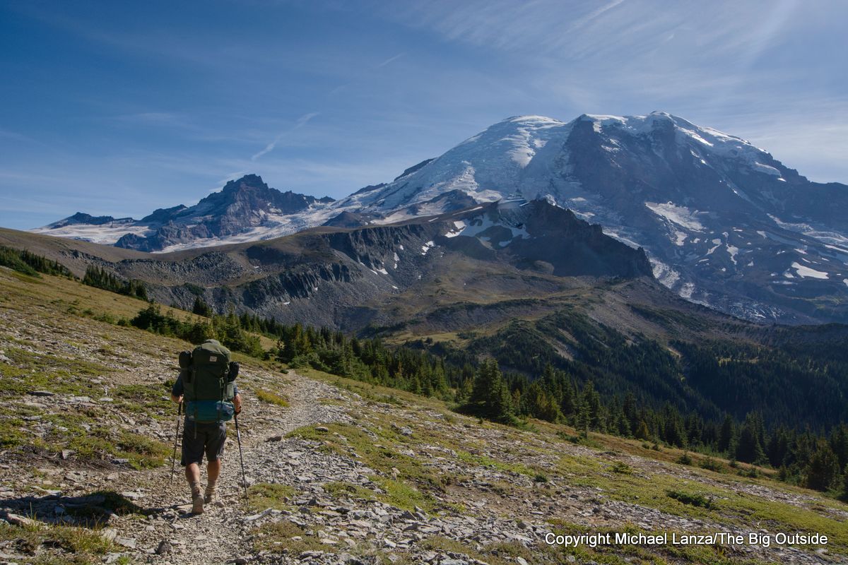 A backpacker descending toward Granite Creek on the Wonderland Trail in Mount Rainier National Park.