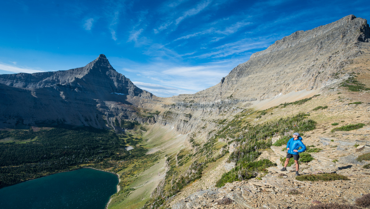 A hiker at Pitamakan Pass in Glacier National Park.