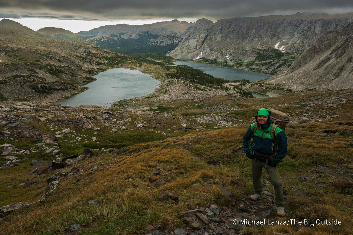 Michael Lanza of The Big Outside above Macon Lake and Washakie Lake on the Washakie Pass Trail in the Wind River Range, Wyoming.