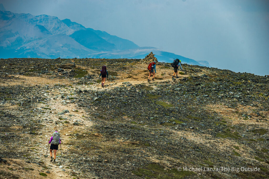 Backpackers hiking north of the Notch, along the Skyline Trail in Jasper National Park. Backpackers hiking north of the Notch, along the Skyline Trail in Jasper National Park.