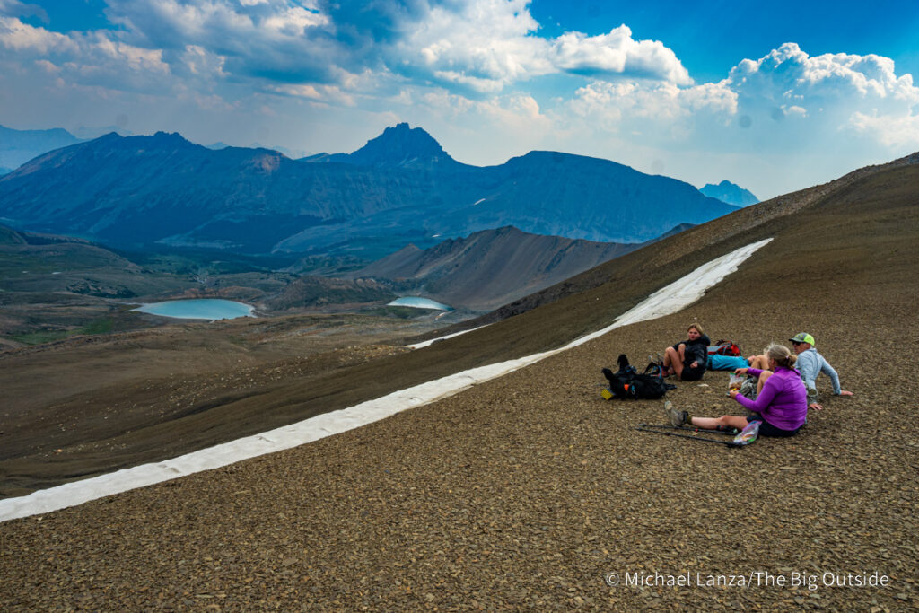 Backpackers taking a break along the Skyline Trail north of the Notch in Jasper National Park. Backpackers taking a break along the Skyline Trail north of the Notch in Jasper National Park.