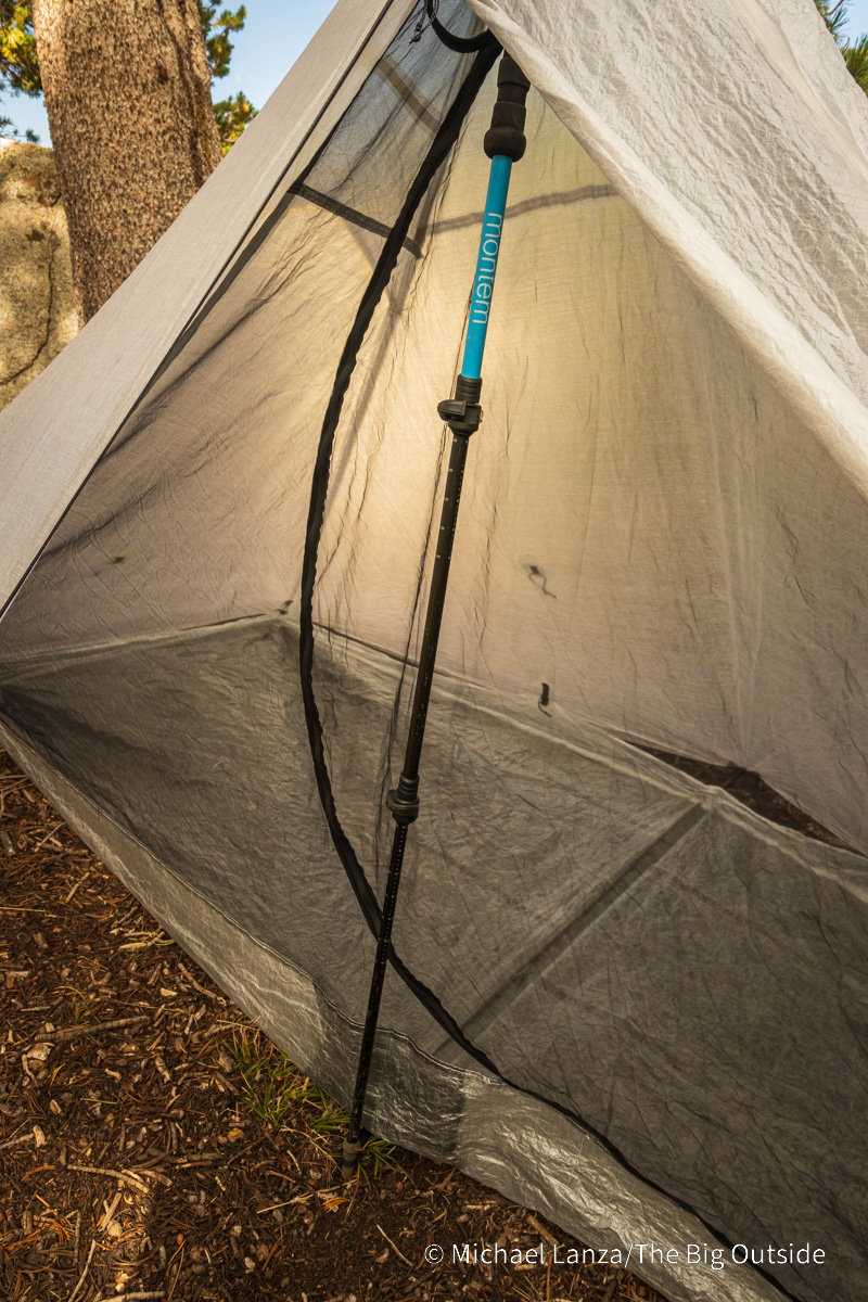 The Hyperlite Mountain Gear Mid-1 with a trekking pole in place.