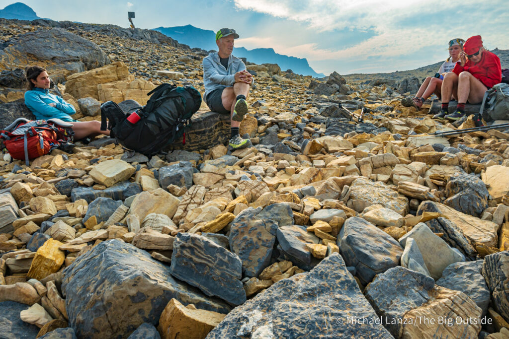 Backpackers resting at Cataract Pass, the boundary between Jasper National Park and the White Goat Wilderness, Canadian Rockies. Backpackers resting at Cataract Pass, the boundary between Jasper National Park and the White Goat Wilderness, Canadian Rockies.