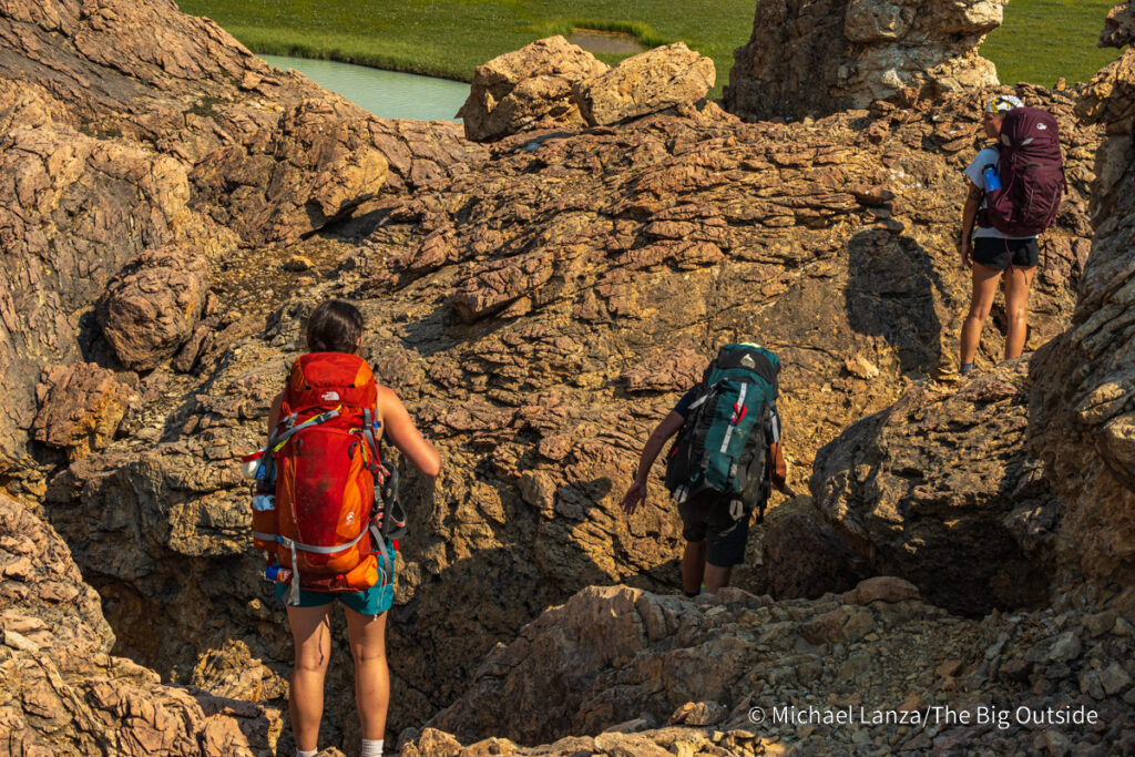Backpackers hiking the Nigel, Cataract, and Cline Passes Route in the upper Brazeau River Valley in Jasper National Park, Canadian Rockies. Backpackers hiking the Nigel, Cataract, and Cline Passes Route in the upper Brazeau River Valley in Jasper National Park, Canadian Rockies.