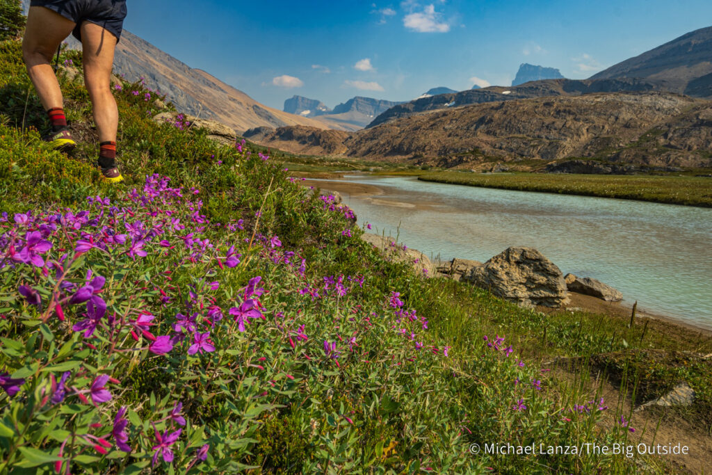 A backpacker hiking the Nigel, Cataract, and Cline Passes Route in the upper Brazeau River Valley in Jasper National Park, Canadian Rockies. A backpacker hiking the Nigel, Cataract, and Cline Passes Route in the upper Brazeau River Valley in Jasper National Park, Canadian Rockies.