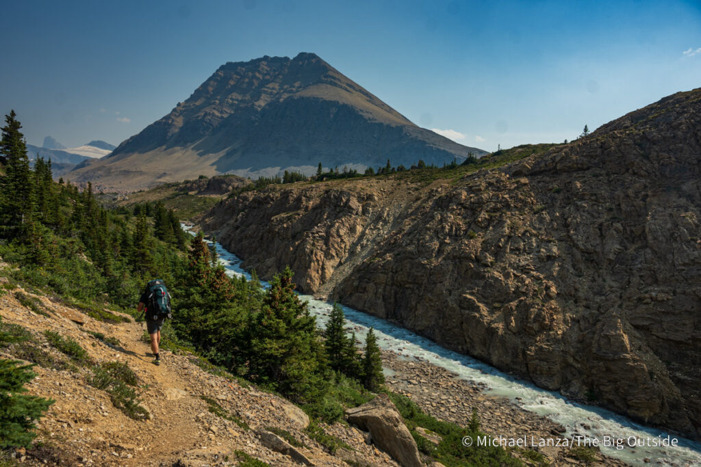 A backpacker hiking the Nigel, Cataract, and Cline Passes Route in the upper Brazeau River Valley in Jasper National Park, Canadian Rockies. A backpacker hiking the Nigel, Cataract, and Cline Passes Route in the upper Brazeau River Valley in Jasper National Park, Canadian Rockies.