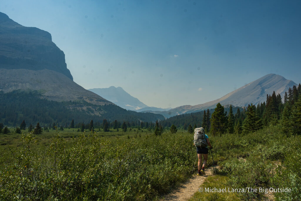 A backpacker hiking the Nigel Pass Trail in Banff National Park, Canadian Rockies. A backpacker hiking the Nigel Pass Trail in Banff National Park, Canadian Rockies.