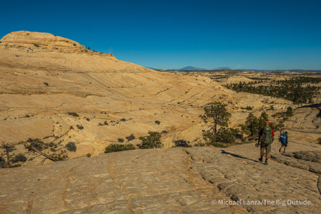 Backpackers on the Boulder Mail Trail in Utah's Grand Staircase-Escalante National Monument. Backpackers on the Boulder Mail Trail in Utah's Grand Staircase-Escalante National Monument.