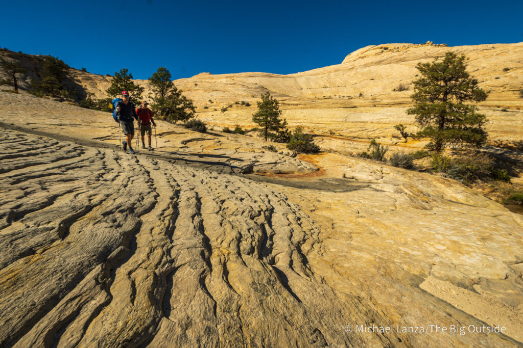 Backpackers on the Boulder Mail Trail in Utah's Grand Staircase-Escalante National Monument. Backpackers on the Boulder Mail Trail in Utah's Grand Staircase-Escalante National Monument.