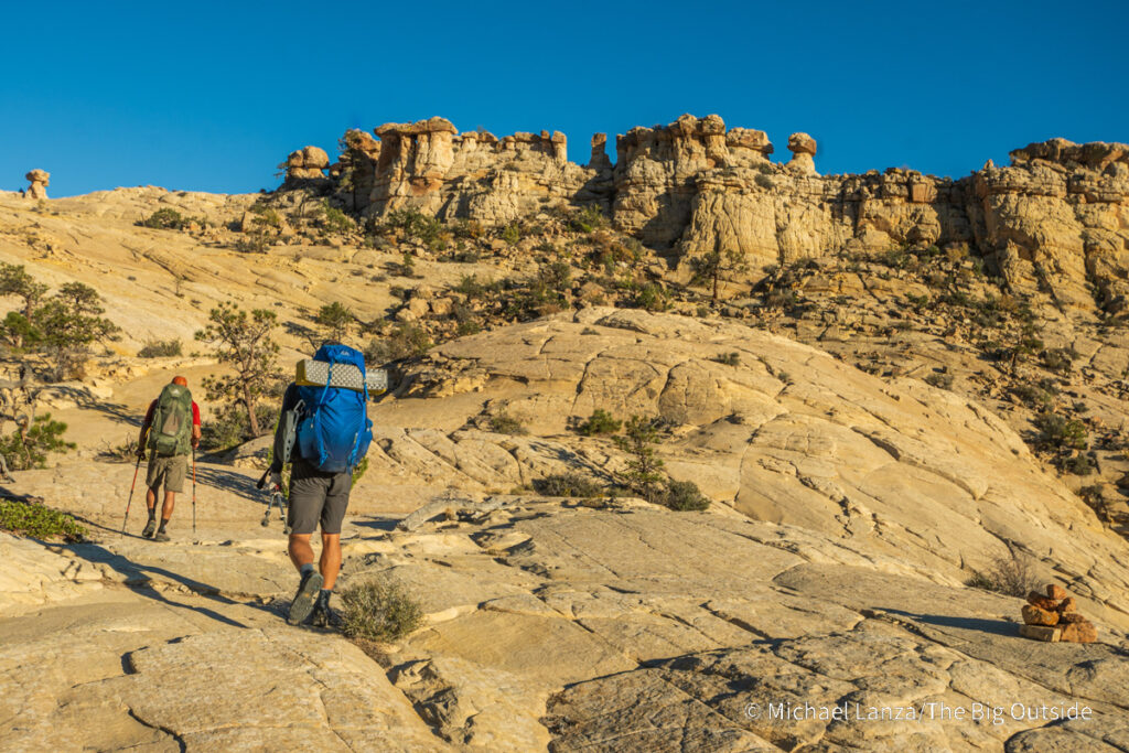 Backpackers on the Boulder Mail Trail in Utah's Grand Staircase-Escalante National Monument. Backpackers on the Boulder Mail Trail in Utah's Grand Staircase-Escalante National Monument.