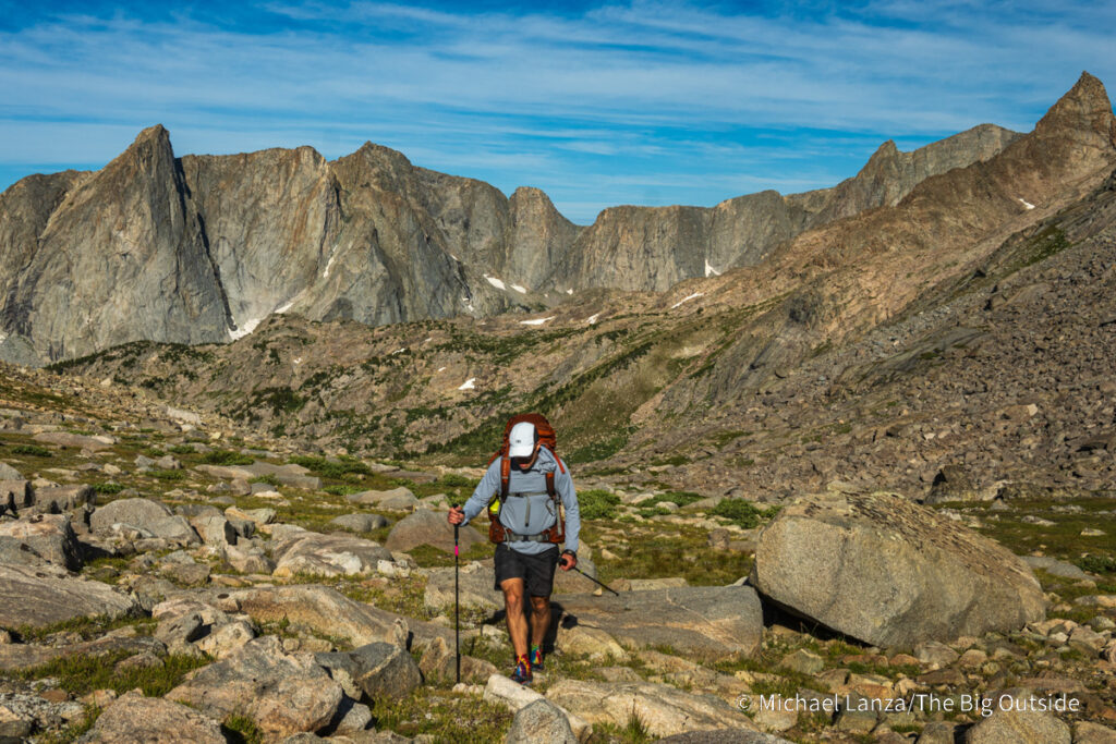 A backpacker hiking the ramp from Pyramid Lake to Hailey Pass in the Wind River Range, Wyoming. A backpacker hiking the ramp from Pyramid Lake to Hailey Pass in the Wind River Range, Wyoming.